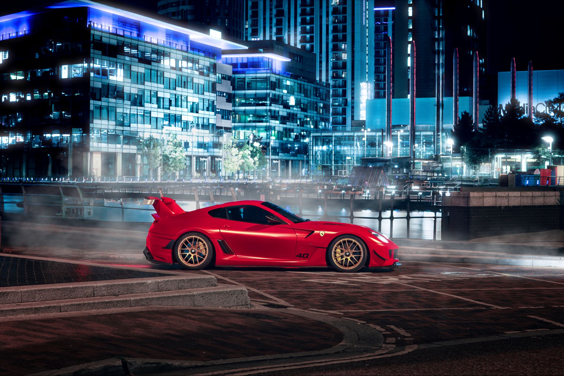 TALOS Ferrari XXT parked city night
